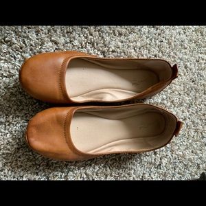 Tan ballet flats